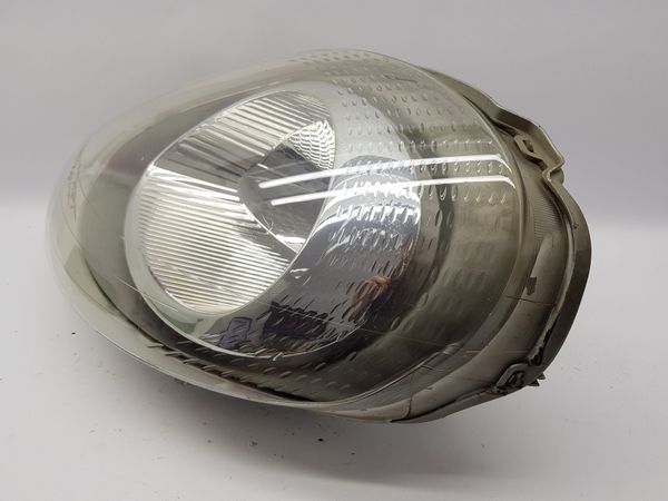 Reflektor Lewy 7700311371  Trafic 2 Renault Valeo